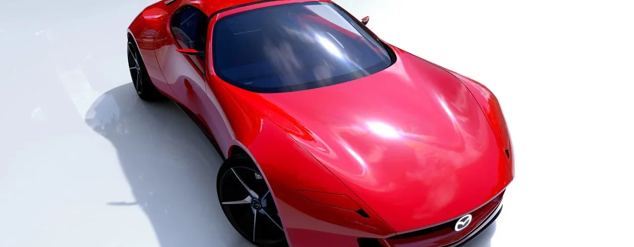 Концепт-кар Mazda Iconic SP на фоне городской застройки