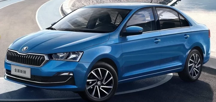 Skoda Rapid седан белого цвета